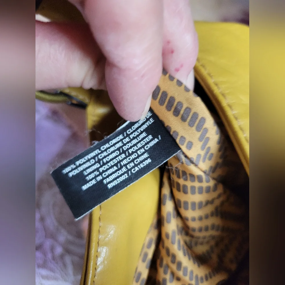 Access a Liz Claiborne company yellow shoulder bag gold tone hardw